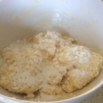 To be able to roll into small balls you'll need extra tapioca flour. Use it in your hands and you can also pour a bit more on the dough.