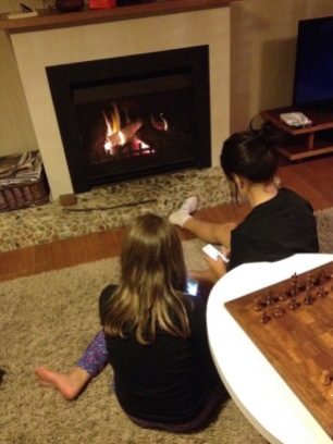 Kids by the fireplace.